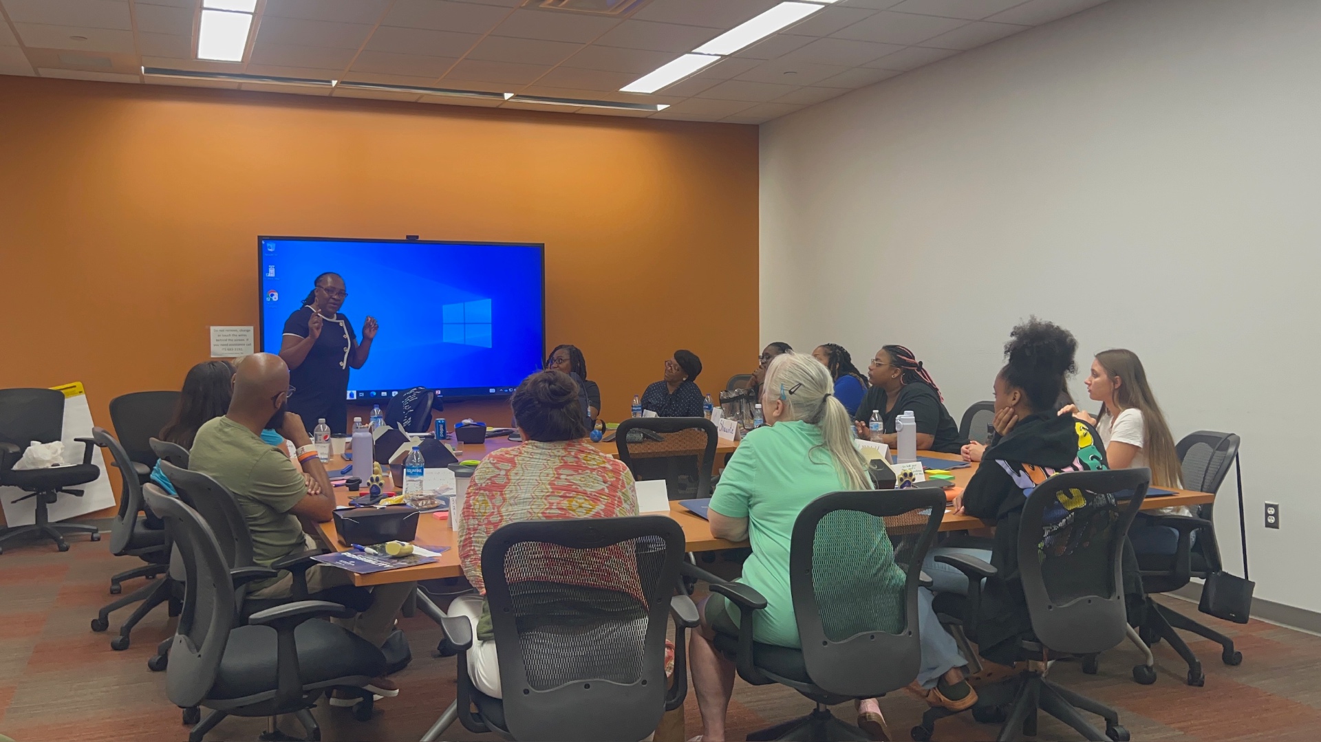 Darlene working with educators